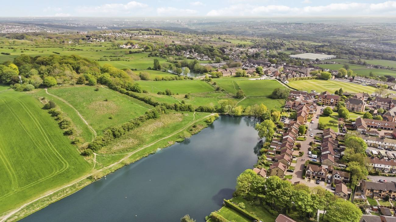 Aerial drone photography of a lakeside development near Leeds